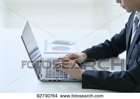 Japanese businessman in the office View Large Photo Image Picture - Japanese businessman in the office. Fotosearch