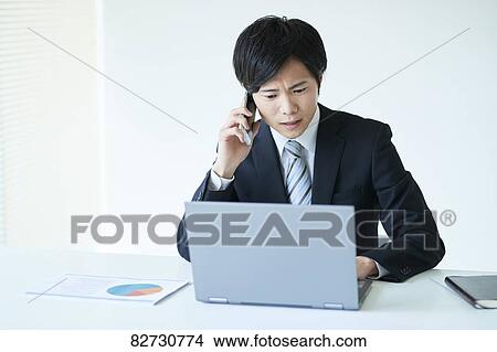 Japanese businessman in the office View Large Photo Image Picture - Japanese businessman in the office. Fotosearch