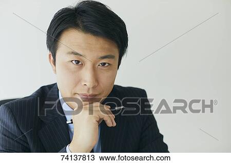 Japanese businessman in the office View Large Photo Image Stock Image - Japanese businessman in the office. Fotosearch