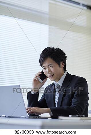 Japanese businessman in the office View Large Photo Image Stock Image - Japanese businessman in the office. Fotosearch