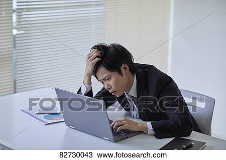 Japanese businessman in the office View Large Photo Image Stock Image - Japanese businessman in the office. Fotosearch