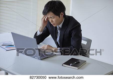 Japanese businessman in the office View Large Photo Image Stock Image - Japanese businessman in the office. Fotosearch