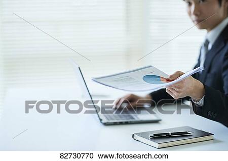 Japanese businessman in the office View Large Photo Image Stock Image - Japanese businessman in the office. Fotosearch