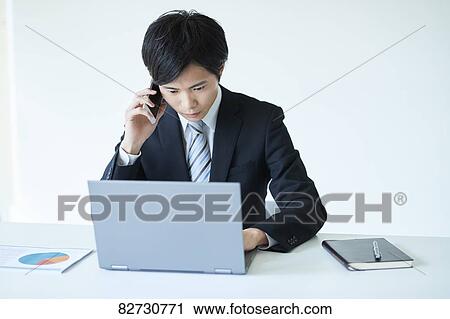 Japanese businessman in the office View Large Photo Image Stock Image - Japanese businessman in the office. Fotosearch