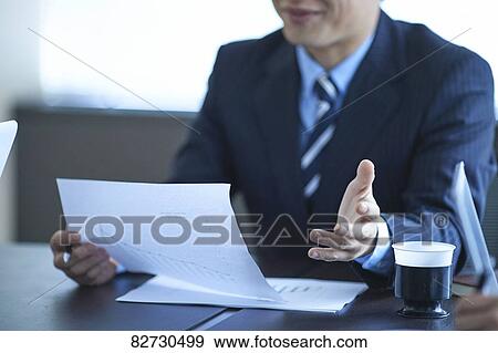 Stock Photo - Japanese businessman in the office. Fotosearch
