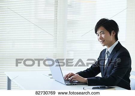 Japanese businessman in the office View Large Photo Image Stock Photo - Japanese businessman in the office. Fotosearch