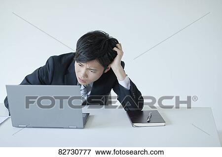 Japanese businessman in the office View Large Photo Image Stock Photo - Japanese businessman in the office. Fotosearch