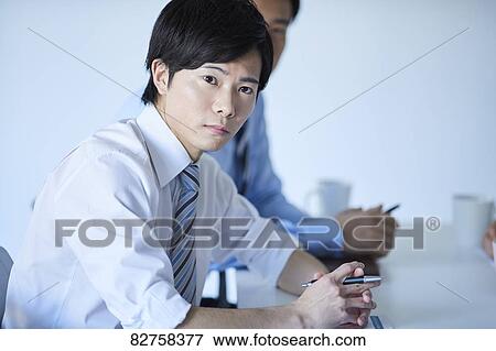 Japanese businessman in the office View Large Photo Image Stock Photo - Japanese businessman in the office. Fotosearch