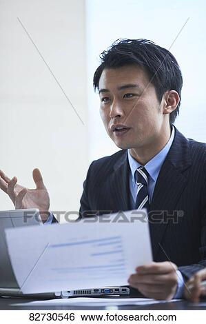 Japanese businessman in the office View Large Photo Image Stock Photograph - Japanese businessman in the office. Fotosearch
