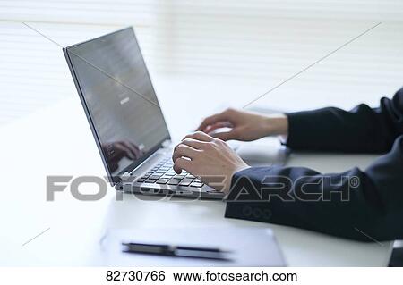 Japanese businessman in the office View Large Photo Image Stock Photograph - Japanese businessman in the office. Fotosearch