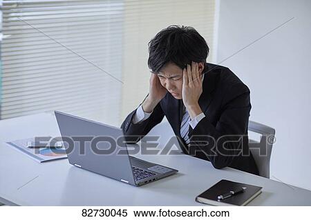 Japanese businessman in the office View Large Photo Image Stock Photography - Japanese businessman in the office. Fotosearch