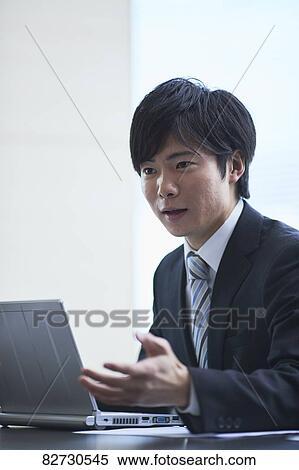 Japanese businessman in the office View Large Photo Image Stock Photography - Japanese businessman in the office. Fotosearch