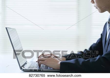 Japanese businessman in the office View Large Photo Image Stock Photography - Japanese businessman in the office. Fotosearch