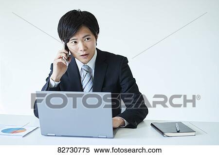 Japanese businessman in the office View Large Photo Image Stock Photography - Japanese businessman in the office. Fotosearch