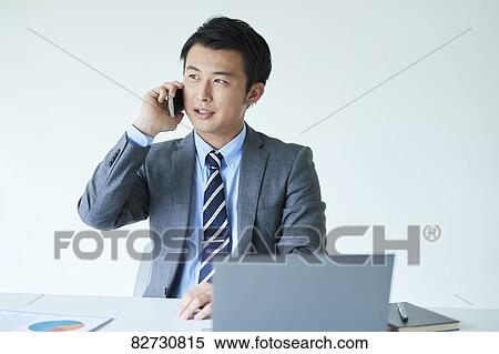 Stock Photography - Japanese businessman in the office. Fotosearch