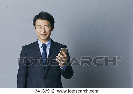 Stock Image - Japanese businessman. Fotosearch