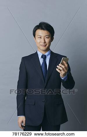 Japanese businessman View Large Photo Image Stock Photo - Japanese businessman. Fotosearch