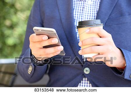 Stock Photo - Japanese businessman with coffee. Fotosearch
