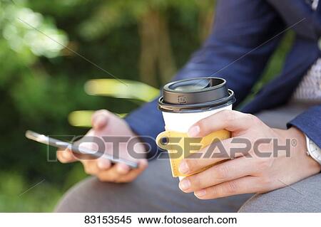 Japanese businessman with coffee View Large Photo Image Stock Photography - Japanese businessman with coffee. Fotosearch