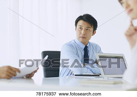 Japanese businessman working View Large Photo Image Stock Photo - Japanese businessman working. Fotosearch