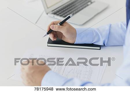 Stock Photo - Japanese businessman working. Fotosearch