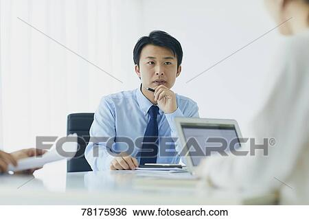 Japanese businessman working View Large Photo Image Stock Photograph - Japanese businessman working. Fotosearch