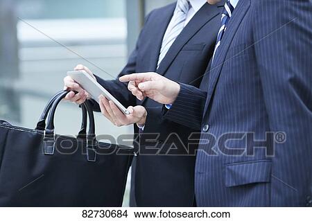 Japanese businesspeople downtown Tokyo View Large Photo Image Picture - Japanese businesspeople downtown Tokyo. Fotosearch