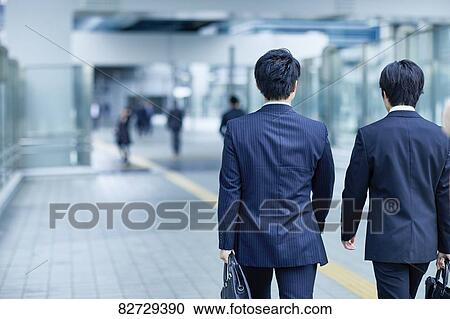 Japanese businesspeople downtown Tokyo View Large Photo Image Stock Image - Japanese businesspeople downtown Tokyo. Fotosearch