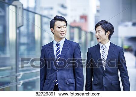 Japanese businesspeople downtown Tokyo View Large Photo Image Stock Image - Japanese businesspeople downtown Tokyo. Fotosearch