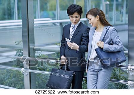 Japanese businesspeople downtown Tokyo View Large Photo Image Stock Image - Japanese businesspeople downtown Tokyo. Fotosearch