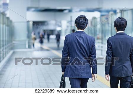 Japanese businesspeople downtown Tokyo View Large Photo Image Stock Photo - Japanese businesspeople downtown Tokyo. Fotosearch