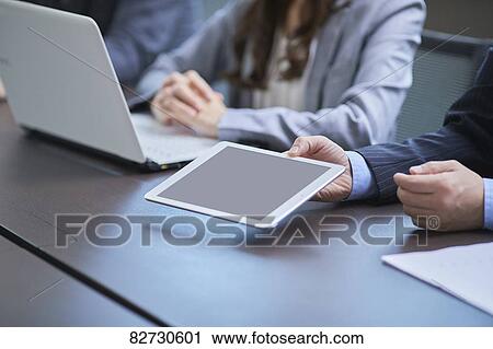 Japanese businesspeople in a meeting View Large Photo Image Stock Image - Japanese businesspeople in a meeting. Fotosearch