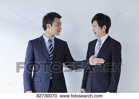 Stock Image - Japanese businesspeople. Fotosearch