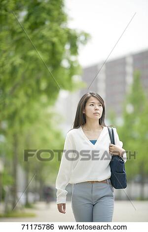 Japanese businesswoman downtown Tokyo View Large Photo Image Stock Photograph - Japanese businesswoman downtown Tokyo. Fotosearch