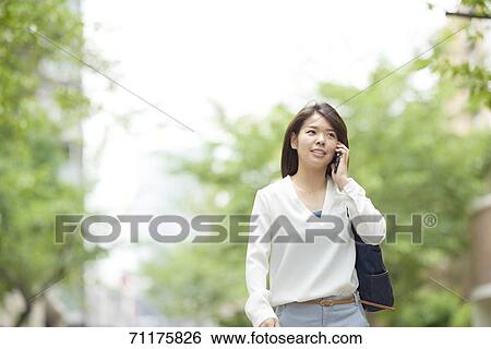 Japanese businesswoman downtown Tokyo View Large Photo Image Stock Photograph - Japanese businesswoman downtown Tokyo. Fotosearch