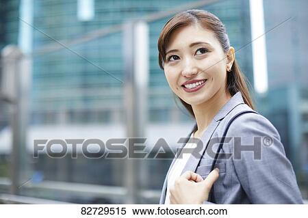 Japanese businesswoman downtown Tokyo View Large Photo Image Stock Photography - Japanese businesswoman downtown Tokyo. Fotosearch