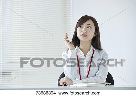 Japanese businesswoman in the office View Large Photo Image Picture - Japanese businesswoman in the office. Fotosearch