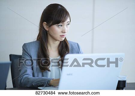 Japanese businesswoman in the office View Large Photo Image Picture - Japanese businesswoman in the office. Fotosearch