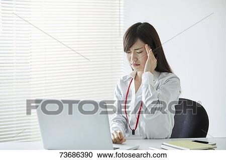 Japanese businesswoman in the office View Large Photo Image Stock Image - Japanese businesswoman in the office. Fotosearch