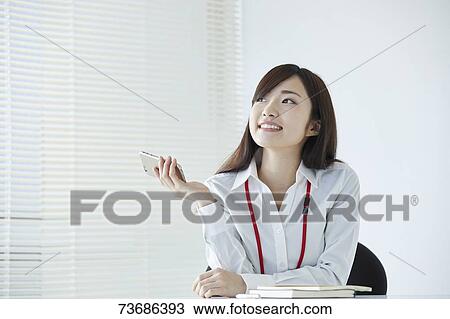 Japanese businesswoman in the office View Large Photo Image Stock Image - Japanese businesswoman in the office. Fotosearch