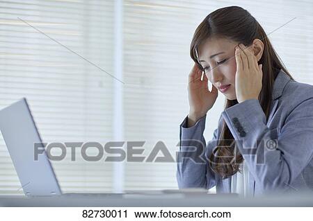 Japanese businesswoman in the office View Large Photo Image Stock Image - Japanese businesswoman in the office. Fotosearch