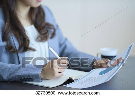 Japanese businesswoman in the office View Large Photo Image Stock Image - Japanese businesswoman in the office. Fotosearch
