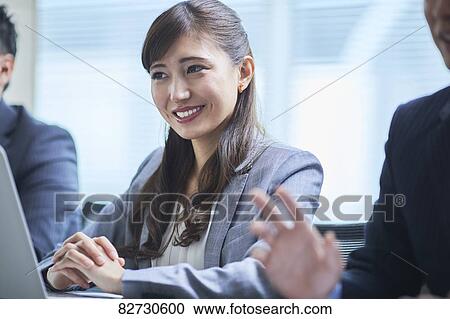 Japanese businesswoman in the office View Large Photo Image Stock Image - Japanese businesswoman in the office. Fotosearch