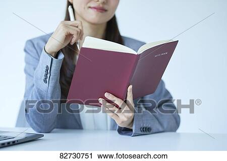 Japanese businesswoman in the office View Large Photo Image Stock Image - Japanese businesswoman in the office. Fotosearch