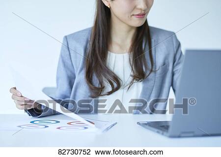Japanese businesswoman in the office View Large Photo Image Stock Image - Japanese businesswoman in the office. Fotosearch