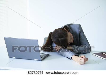 Stock Image - Japanese businesswoman in the office. Fotosearch
