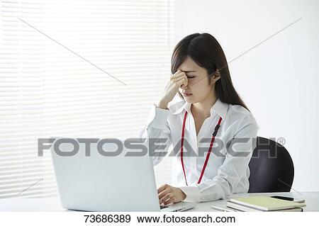 Stock Photo - Japanese businesswoman in the office. Fotosearch