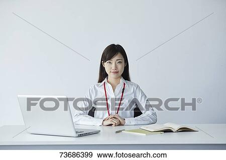 Stock Photo - Japanese businesswoman in the office. Fotosearch