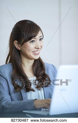 Japanese businesswoman in the office View Large Photo Image Stock Photo - Japanese businesswoman in the office. Fotosearch