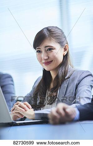 Stock Photo - Japanese businesswoman in the office. Fotosearch
